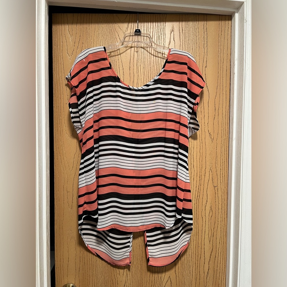 Torrid short sleeve tunic with black and coral stripes. Size 1.